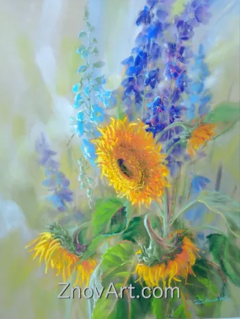 A sunny day. Sunflowers, delphinium